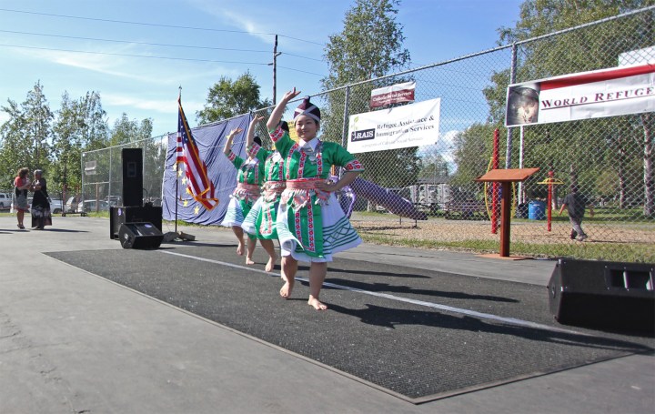Hmong dancers perform during a World Refugee Day celebration at Mountain View Lions Park, June 2014.